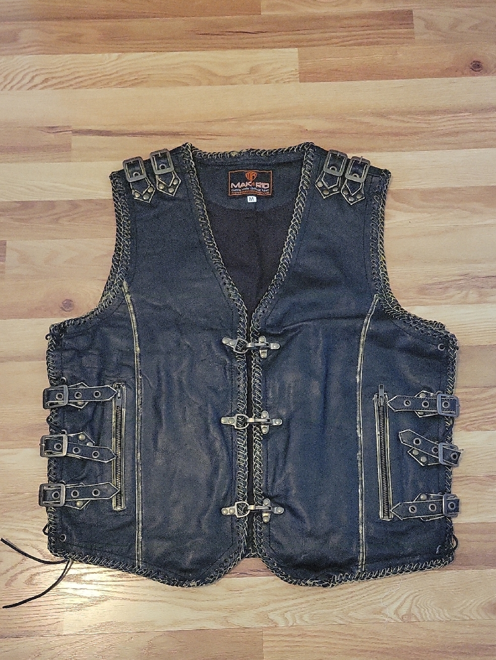 Black Leather Motorcycle Vest with Buckle Accents